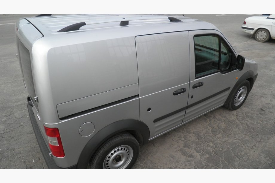 Ford Connect 2002–2006 Hromēti jumta reliņi Standarta bāze, plastmasas stiprinājuma pēdas Foto 2