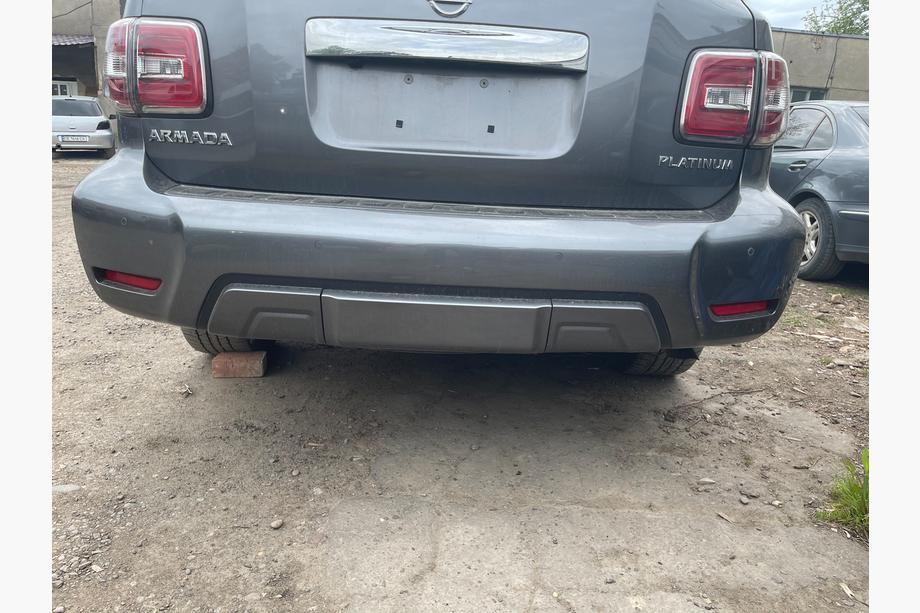 Nissan Armada 2016–2024 Aizmugurējais buferis komplektā (oriģināls 2019) Image