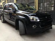 Volkswagen Amarok 2010–2022 Priekšējā bampera uzlika (krāsošanai) foto 2