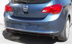 Opel Astra J 2009–2015 Aizmugurējā difuzora uzlika (krāsošanai) foto 1