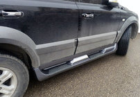 Kia Sorento I BL 2002–2009 Plastmasas sānu sliekšņi (plastmasa) foto 1