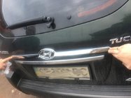 Hyundai Tucson JM 2004– Plastmasas uzlika virs numura zīmes foto 4
