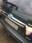 Hyundai Tucson JM 2004– Plastmasas uzlika virs numura zīmes foto 5