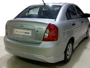 Hyundai Accent 2006–2010 Aizmugurējā apakšējā uzlika (krāsošanai) foto 1