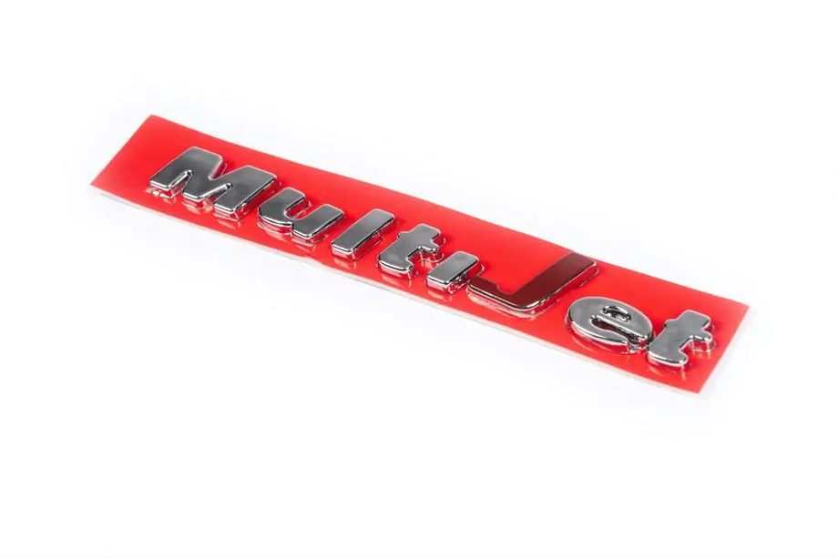 Opel Corsa C 2000–2006 Multijet uzraksta emblemma (pašlīmējoša) Image