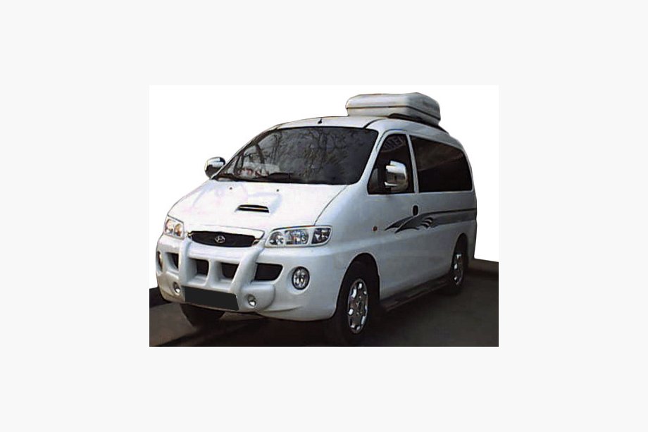 Hyundai H200, H1, Starex 1998–2007 Centrālā bampera lūpa ar miglas lukturu izgriezumiem (krāsošanai) Image