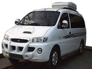 Hyundai H200, H1, Starex 1998–2007 Centrālā bampera lūpa ar miglas lukturu izgriezumiem (krāsošanai) foto 1