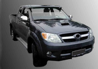 Toyota Hilux 2006–2015 Vējstikla saulessargs (uz kronšteiniem) foto 1