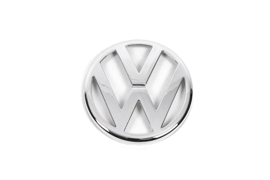 Volkswagen T4 Transporter 1990–2003 Priekšējā emblēma 1J0 853 601 (augšējā daļa, slīps motora pārsegs) Image