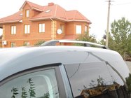 Volkswagen Caddy 2010–2015 Hromēti jumta reliņi foto 2