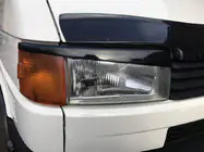 Volkswagen T4 Transporter 1990–2003 Priekšējo lukturu uzacis, taisns kapots (2 gab.) foto 1