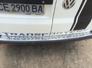 Volkswagen T5 Transporter 2003–2010 Aizmugurējā bufera aizsarguzlika ar melniem ieliktņiem (nerūsējošais tērauds) foto 2