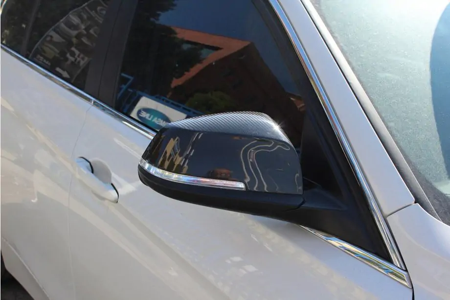 BMW X1 E84 2009–2015 Spoguļu uzlikas (2 gab., īsts oglekļa šķiedras karbons) Image