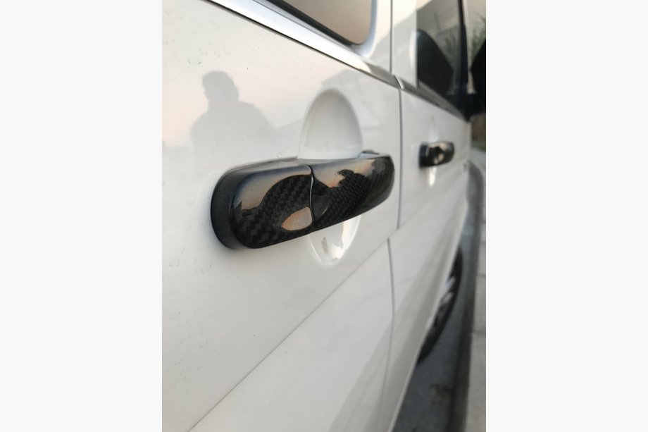 Volkswagen Caddy 2004–2010 Durvju rokturu uzlikas (īsta oglekļa šķiedra) Foto 2