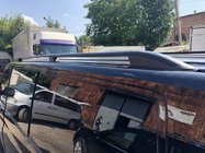 Volkswagen T5 Caravelle 2004–2010 Jumta reliņi Skyport (melni) Garā riteņu bāze foto 3