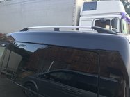 Volkswagen Caddy 2004–2010 Hromēti jumta reliņi Maxi, plastmasas kājiņas foto 1