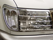 Toyota Land Cruiser 100 1998–2007 Priekšējo lukturu uzlikas V2 (2 gab., plastmasa) foto 1