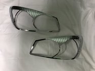 Kia Cerato 1 2004–2009 Hromētas priekšējo lukturu uzlikas (2 gab., plastmasa) foto 1