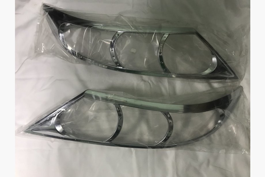 Kia Sorento II XM 2009–2014 Priekšējo lukturu uzlikas 2010-2013 (2 gab., plastmasa) Image