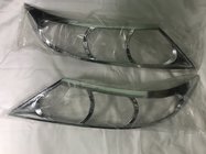 Kia Sorento II XM 2009–2014 Priekšējo lukturu uzlikas 2010-2013 (2 gab., plastmasa) foto 1