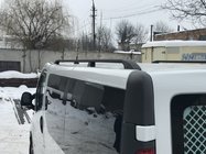 Renault Trafic 2001–2015 Melni jumta reliņi Garā versija, plastmasas kājiņas foto 1