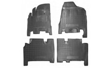 Kia Carnival 2002–2013 Gumijas paklājiņi ar bortu АКПП 2006+ 1. un 2. rinda (Autogumm) foto 1