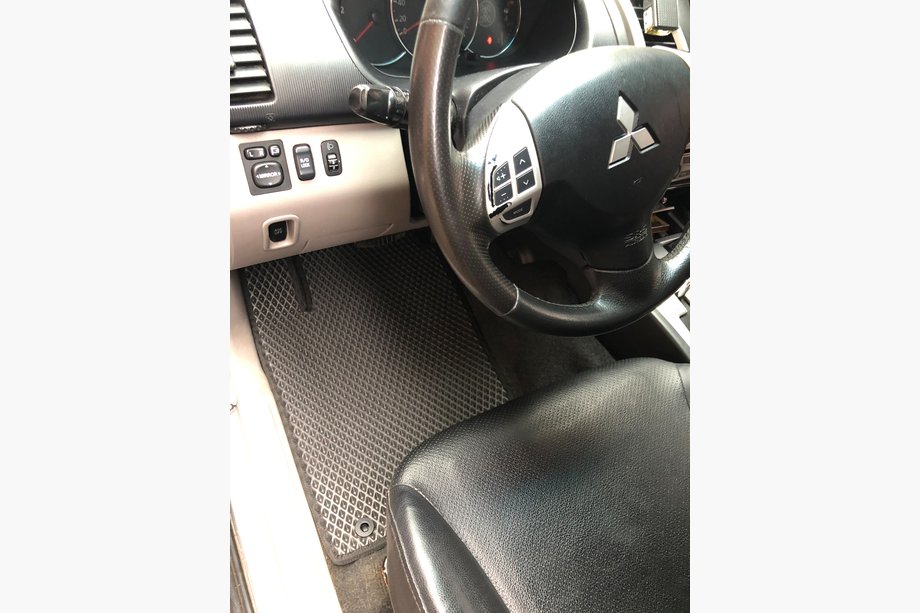Mitsubishi Pajero Sport 2008–2015 EVA auto paklājiņi (melni) Image