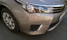 Toyota Corolla 2013–2019 Miglas lukturu uzlikas (2013-2016, nerūsējošais tērauds) foto 1