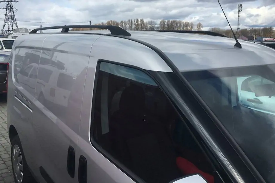 Fiat Doblo II 2010–2022 melni jumta reliņi Image