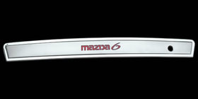Mazda 6 2003–2008 Hromēta līste ar sarkanu apgaismojumu (plastmasa) foto 1