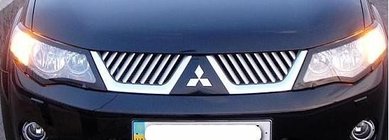 Mitsubishi Outlander 2006–2012 Radiatora režģa uzlikas (2006-2010, nerūsējošais tērauds) foto 1