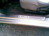 Mitsubishi Lancer 9 2004–2008 Durvju sliekšņu uzlikas OmsaLine (4 gab., nerūsējošais tērauds) foto 2