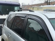 Toyota Land Cruiser Prado 120 2002–2009 Melni turku jumta reliņi Plastmasas stiprinājuma kājas foto 7