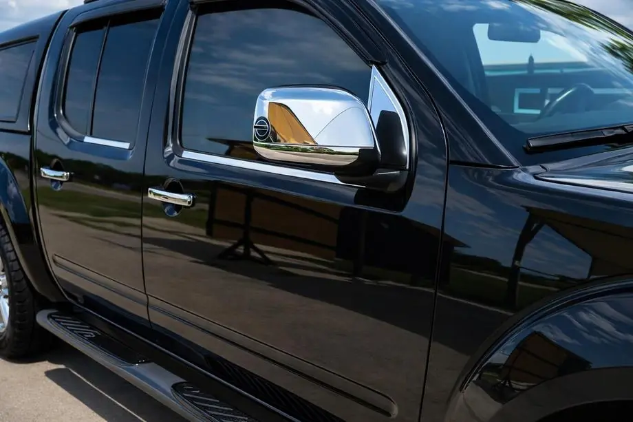 Nissan Navara 2006–2015 Uzlikas logu vēja deflektoriem (2 gab., nerūs. tērauds) Image