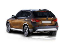 BMW X1 E84 2009–2015 Nerūsējošā tērauda līste virs numura zīmes foto 1