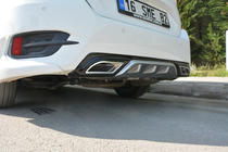 Honda Civic Sedans X 2016–2021 Aizmugurējā bampera difuzors (Meliset, krāsots) foto 1