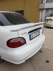 Hyundai Accent 1994–1999 Spoileris Meliset (krāsošanai) foto 1
