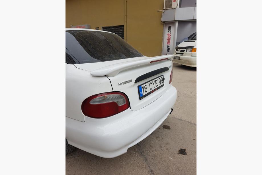 Hyundai Accent 1994–1999 Spoileris Meliset (krāsošanai) Image