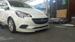 Opel Corsa E 2015–2019 Priekšējā apakšējā spoilerlūpa (krāsošanai) foto 1