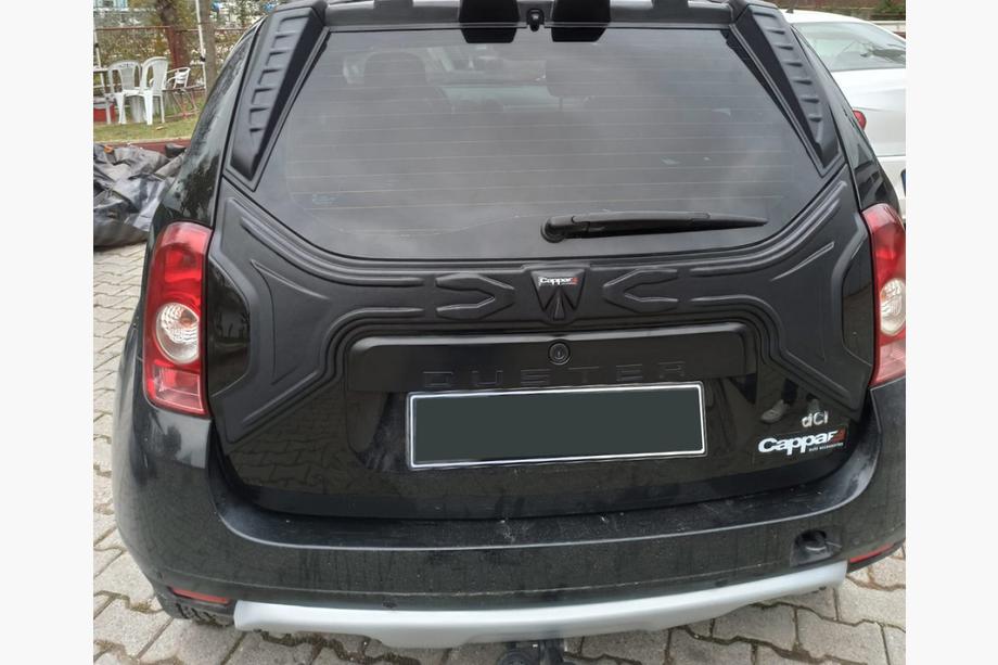 Renault Duster 2008–2017 Plastmasas uzlika bagāžnieka vākam Foto 4