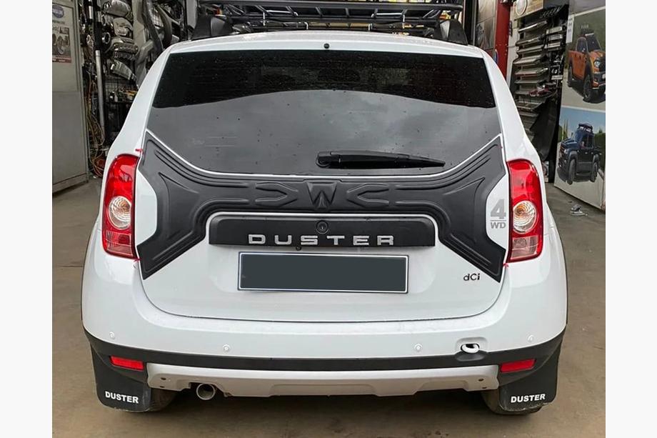 Renault Duster 2008–2017 Plastmasas uzlika bagāžnieka vākam Foto 1