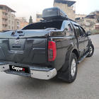 Nissan Navara 2006–2015 Bagāžnieka vāka uzlika (ABS) foto 2