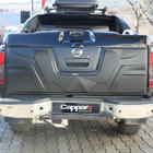 Nissan Navara 2006–2015 Bagāžnieka vāka uzlika (ABS) foto 1