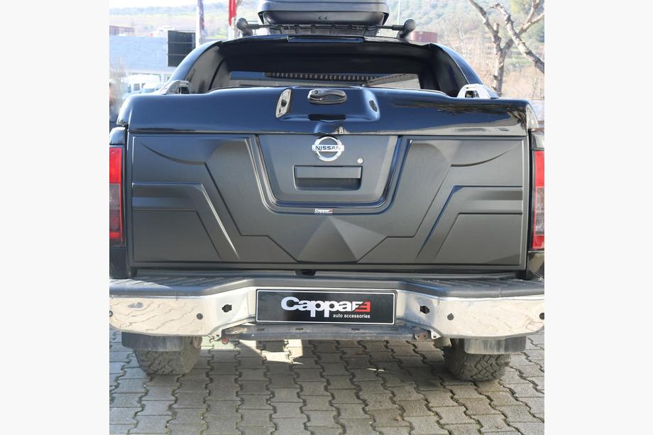 Nissan Navara 2006–2015 Bagāžnieka vāka uzlika (ABS) Image