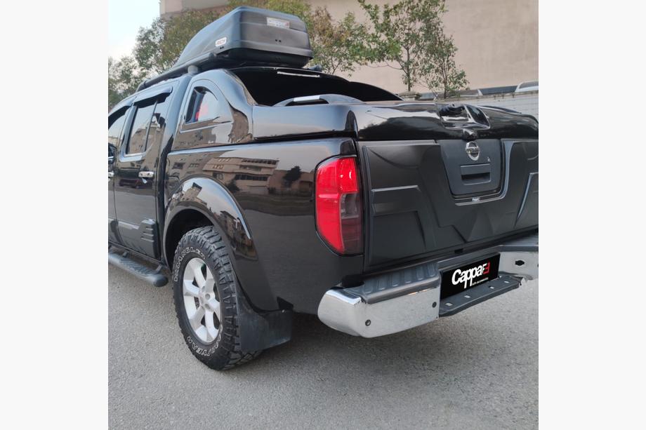 Nissan Navara 2006–2015 Bagāžnieka vāka uzlika (ABS) Foto 3