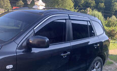 Hyundai Santa Fe 2 2006–2012 Logu vēja deflektori ar hromētu līsti (4 gab., Niken) foto 1