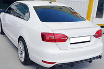 Volkswagen Jetta 2011–2018 OEM spoilers (krāsošanai) foto 1