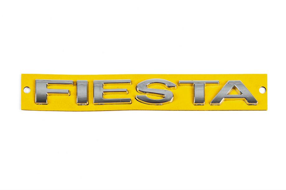 Ford Fiesta 2002–2008 Fiesta uzraksta emblēma 138 x 15 mm (OEM) Image