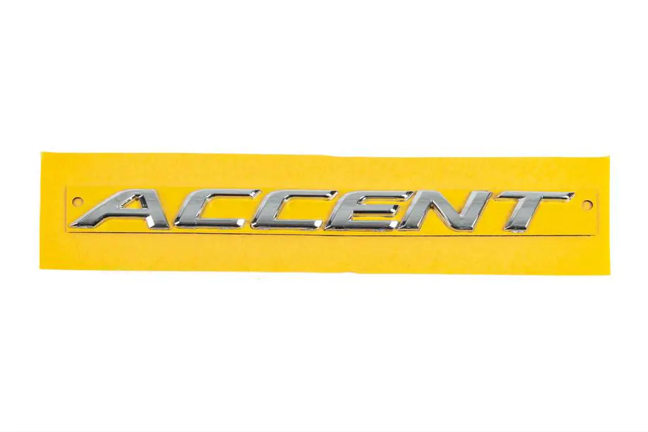 Hyundai Accent 2011–2017 Emblēma (uzraksts) Accent 86311-1R000 (190 mm x 16 mm) Image
