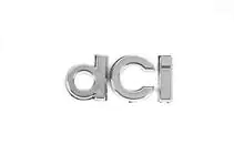 Renault Megane III 2009–2016 DCI uzraksts 908894256R (55 x 24 mm) foto 1